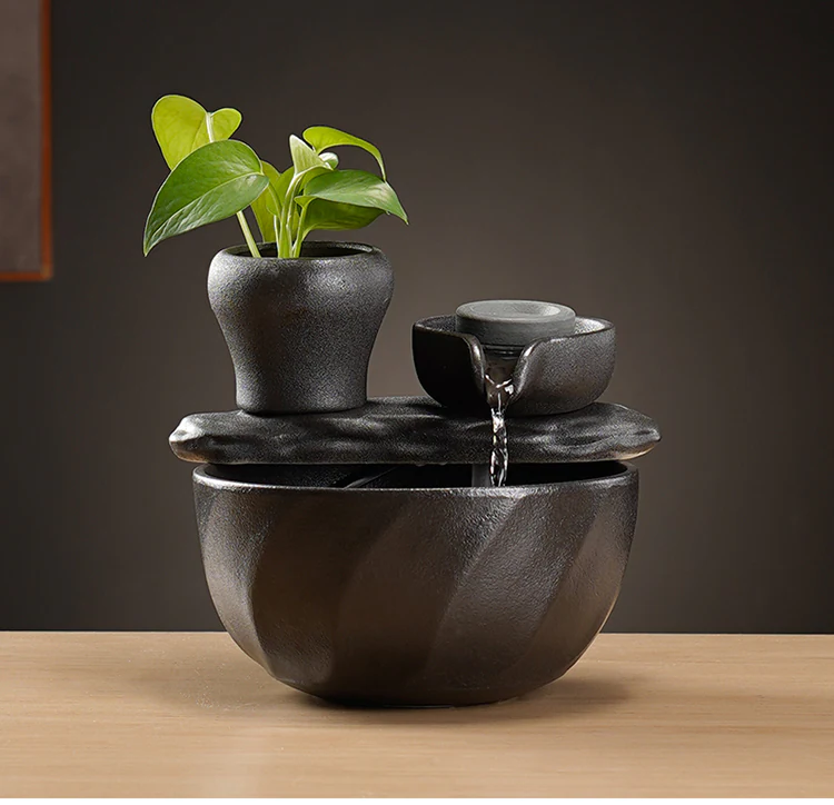 AH compact black ceramic tabletop fountain with plant pot and flowing water