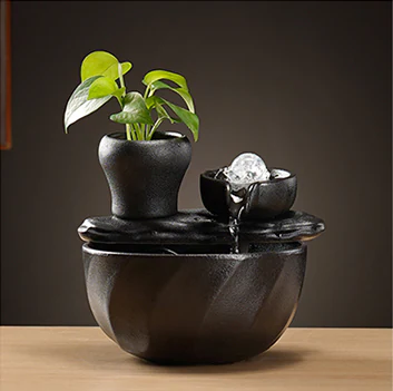 Tabletop fountain design with a crystal sphere water feature